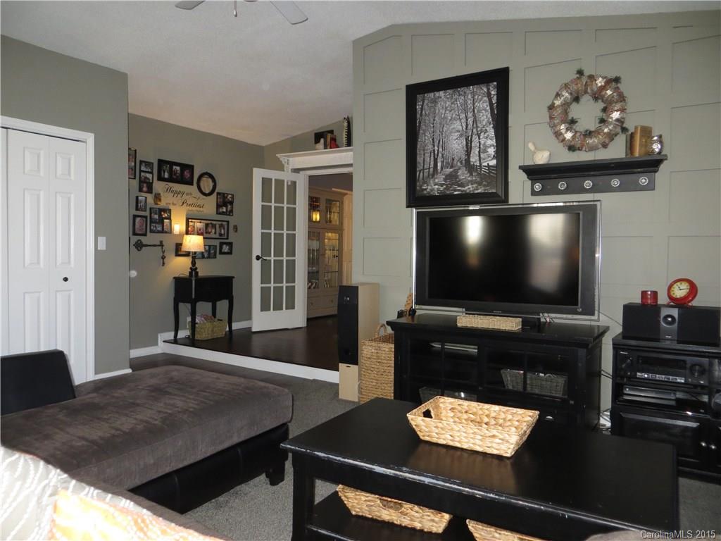 732 Ike Lynch Road Dallas, NC 28034 - Photo 4 of 24 a living room with furniture and a flat screen tv