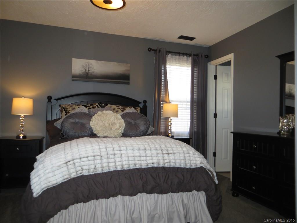 732 Ike Lynch Road Dallas, NC 28034 - Photo 9 of 24 a bedroom with a bed and window
