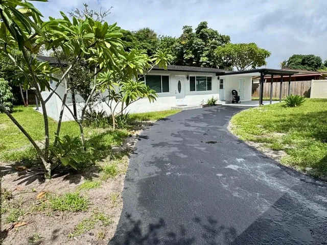 a view of a back yard of the house