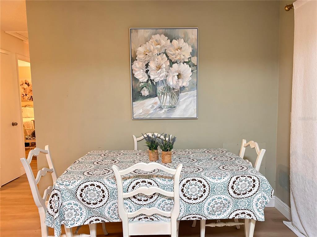 6029 Wyoming Avenue New Port Richey, FL 34653 - Photo 5 of 14 a view of table and chairs