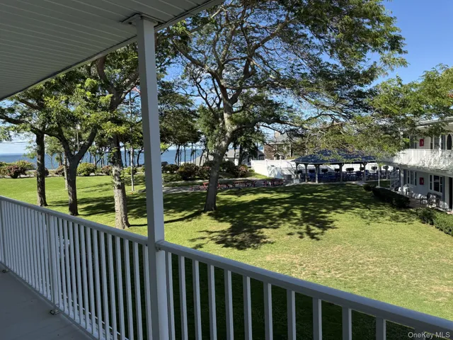 a view of swimming pool from a balcony