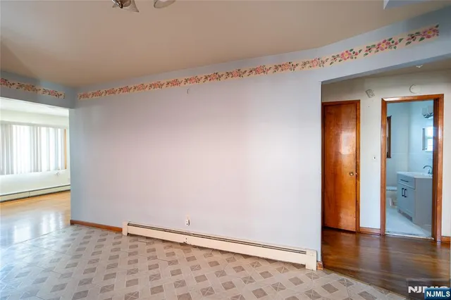 a view of a kitchen with a sink and windows