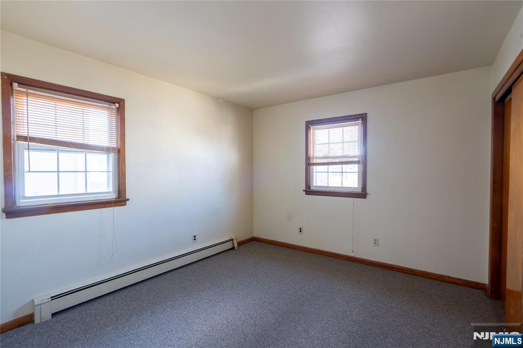 24 Mahar Avenue Clifton, NJ 07011 - Photo 13 of 20 an empty room with a window