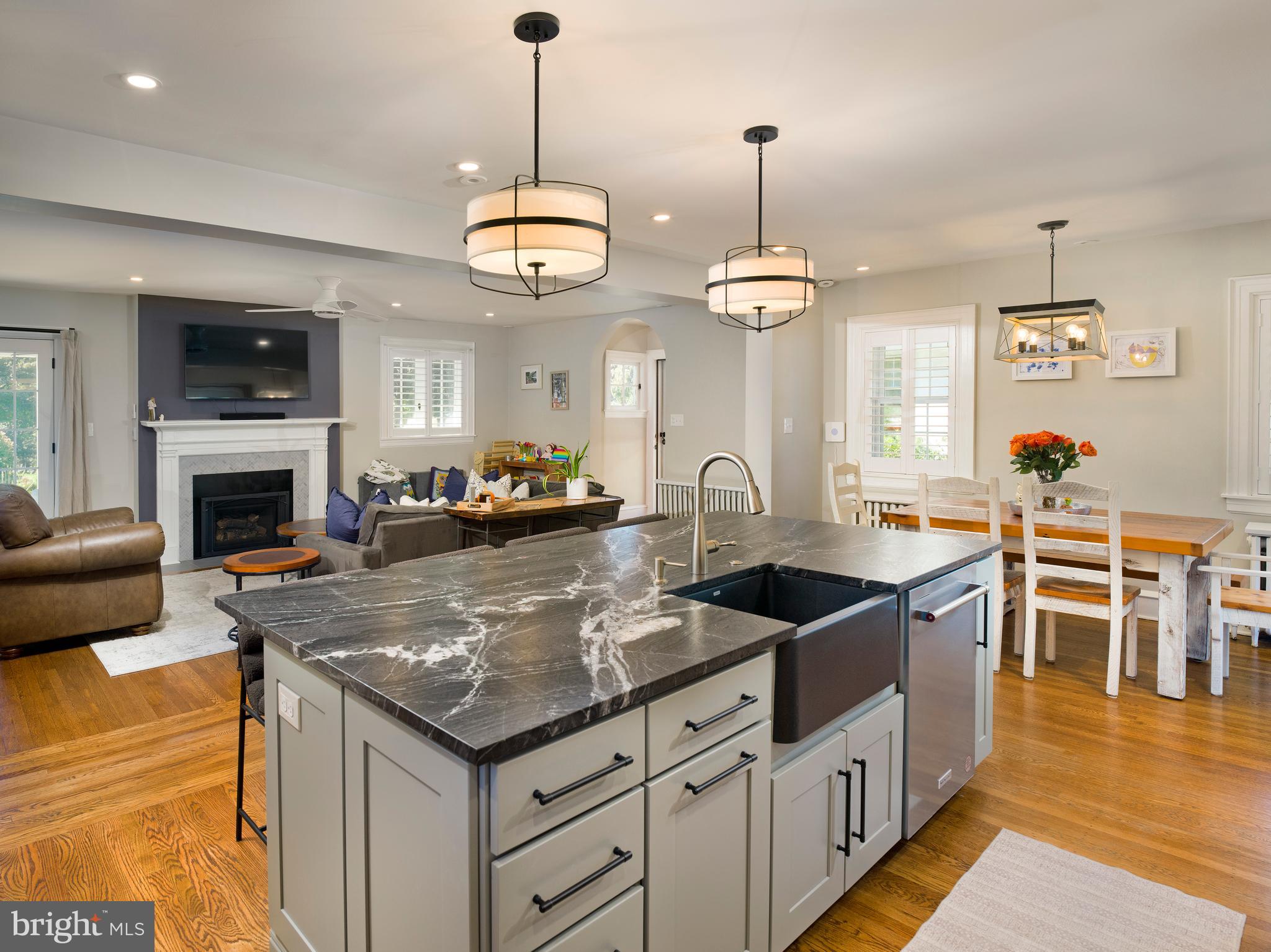 11 Shirley Road Narberth, PA 19072 - Photo 14 of 44 a kitchen with granite countertop stove top oven and refrigerator