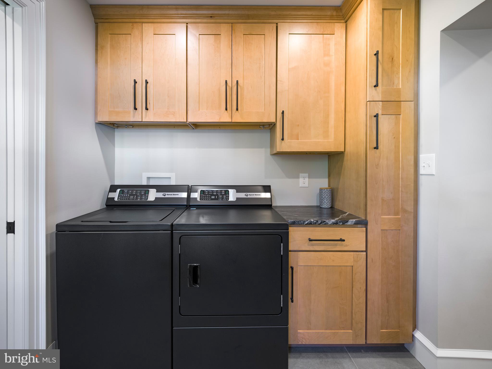 11 Shirley Road Narberth, PA 19072 - Photo 21 of 44 a kitchen with stainless steel appliances granite countertop white cabinets sink and a window