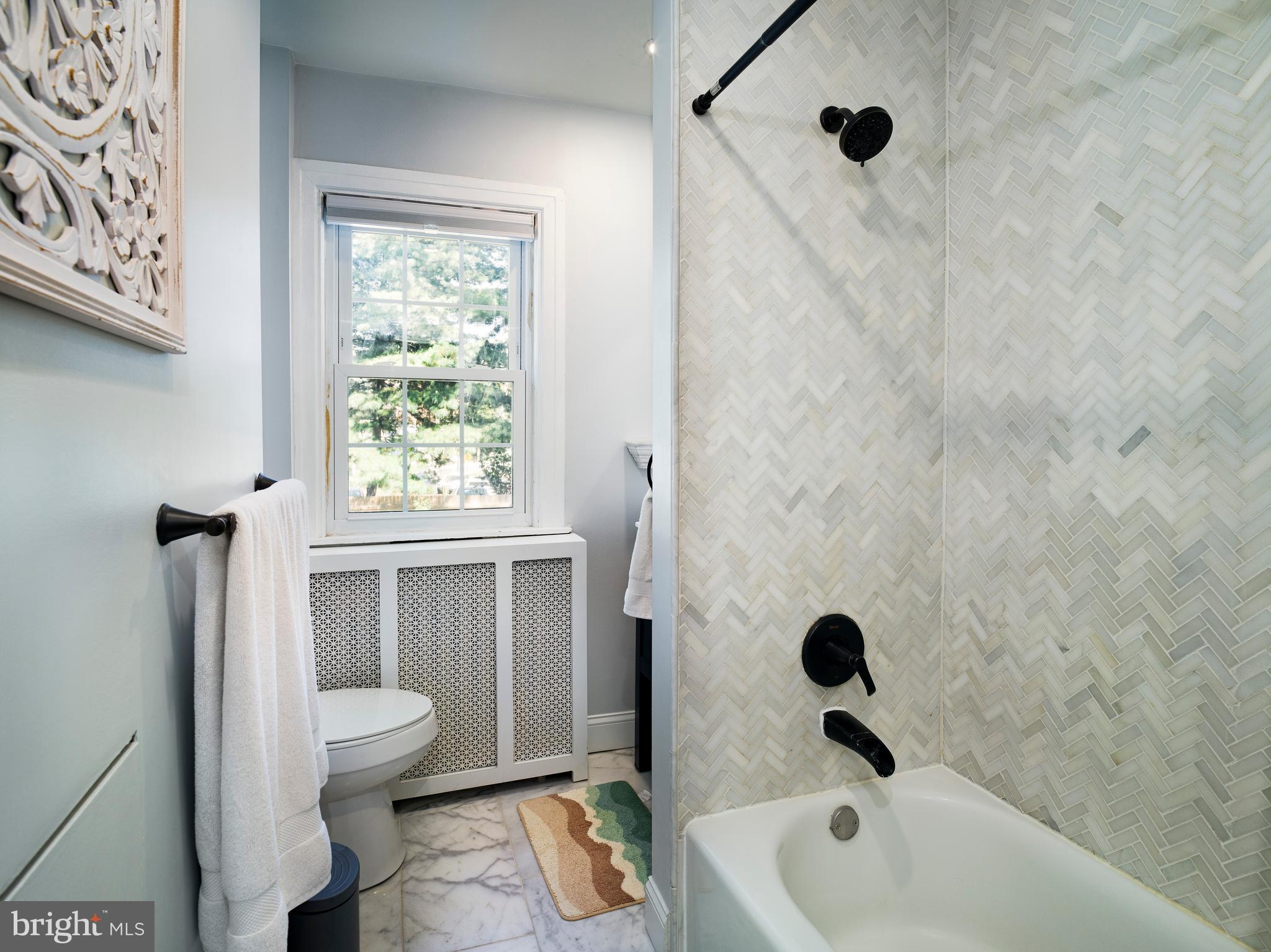 11 Shirley Road Narberth, PA 19072 - Photo 29 of 44 a bathroom with a sink and a bathtub