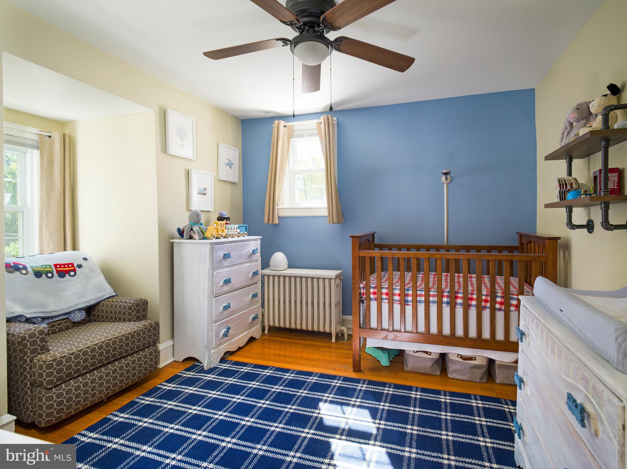 11 Shirley Road Narberth, PA 19072 - Photo 30 of 44 a bedroom with furniture and a window