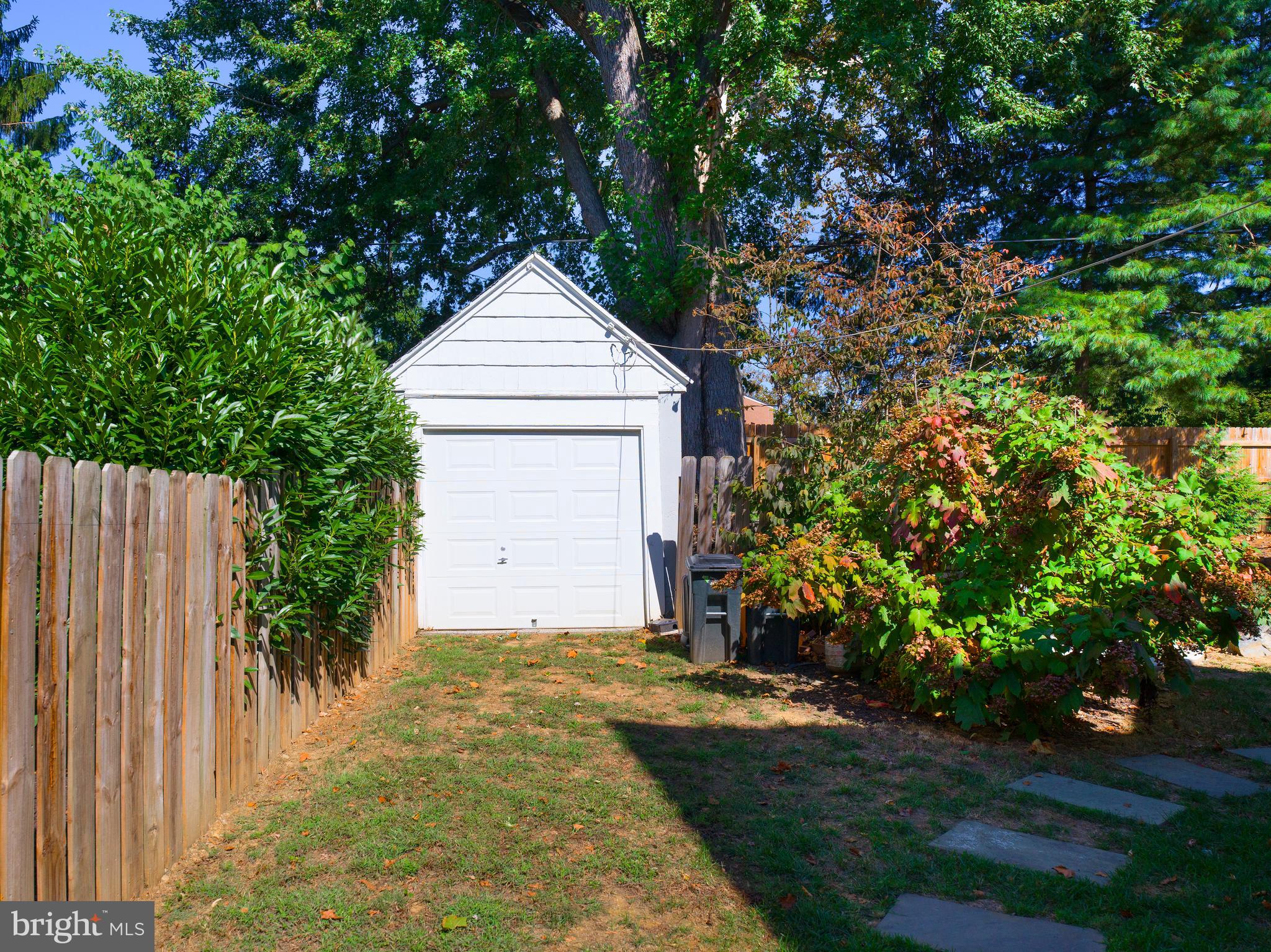 11 Shirley Road Narberth, PA 19072 - Photo 44 of 44 a front view of a house with a yard and garage