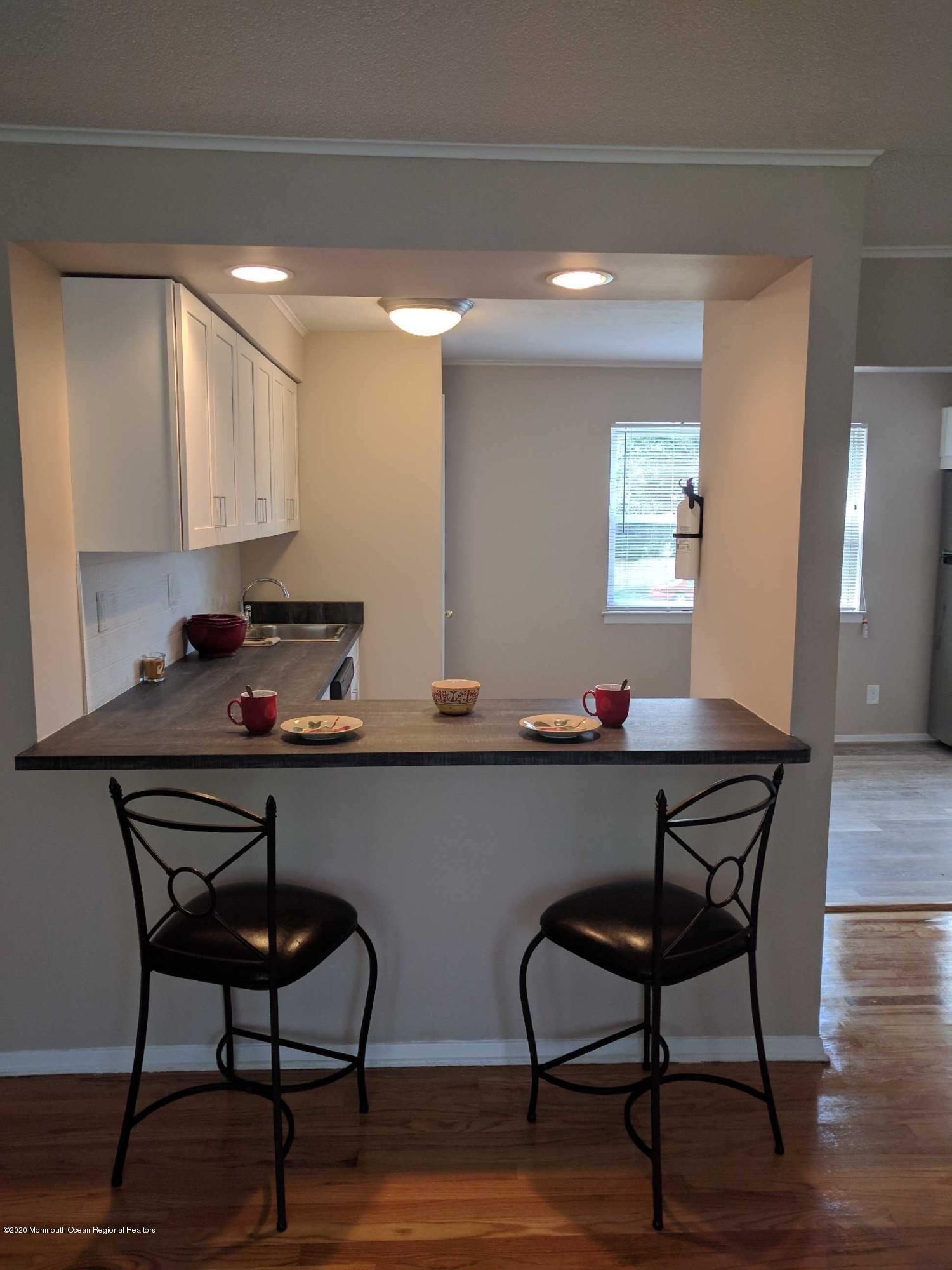 3 Sutton Drive, Unit A10 Matawan, NJ 07747 - Photo 4 of 7 A10 Kitchen with props