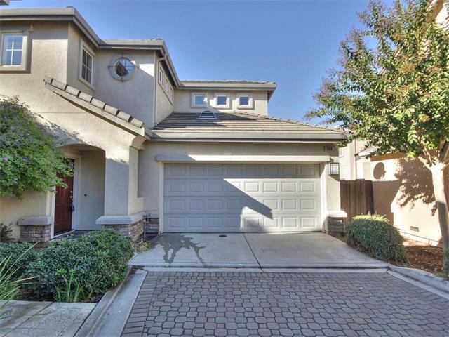 1806 Wayne Circle San Jose, CA 95131 - Photo 2 of 21 a front view of a house with a yard