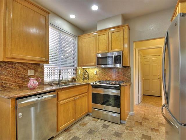 1806 Wayne Circle San Jose, CA 95131 - Photo 8 of 21 a kitchen with stainless steel appliances granite countertop a sink stove and refrigerator
