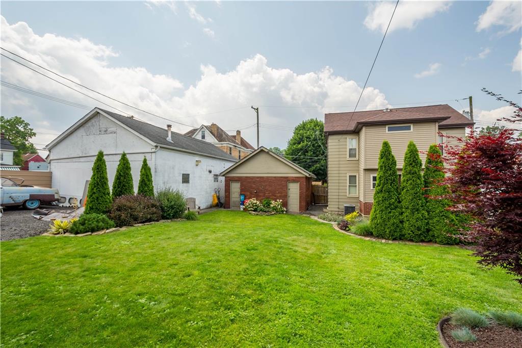 1520 1/2 4th Avenue Coraopolis, PA 15108 - Photo 18 of 20 a front view of house with yard and green space