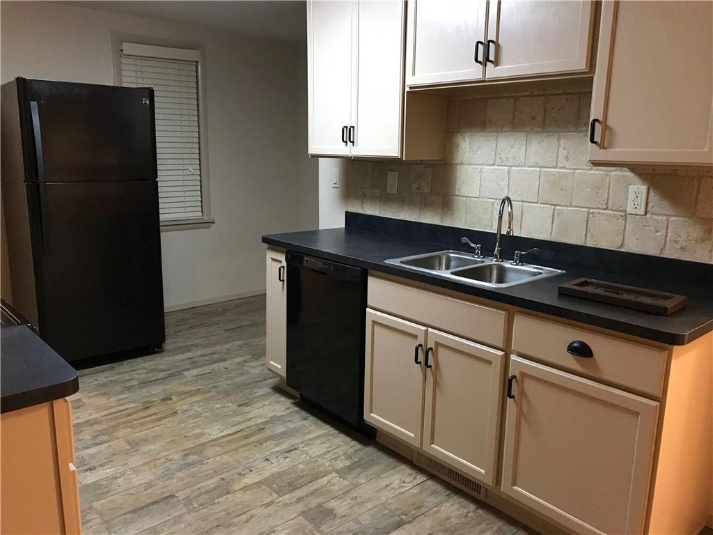 1520 1/2 4th Avenue Coraopolis, PA 15108 - Photo 7 of 20 a kitchen with granite countertop cabinets and sink