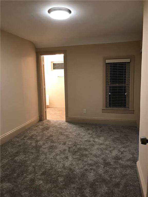 1520 1/2 4th Avenue Coraopolis, PA 15108 - Photo 9 of 20 an empty room with a empty space and windows