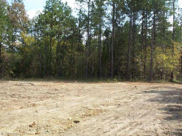 202 Rockcrusher Road Lexington, NC 27292 - Photo 1 of 1 Exterior Front. PARTIALLY CLEARED AND LEVEL.