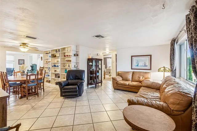 a living room with furniture and a view of living room