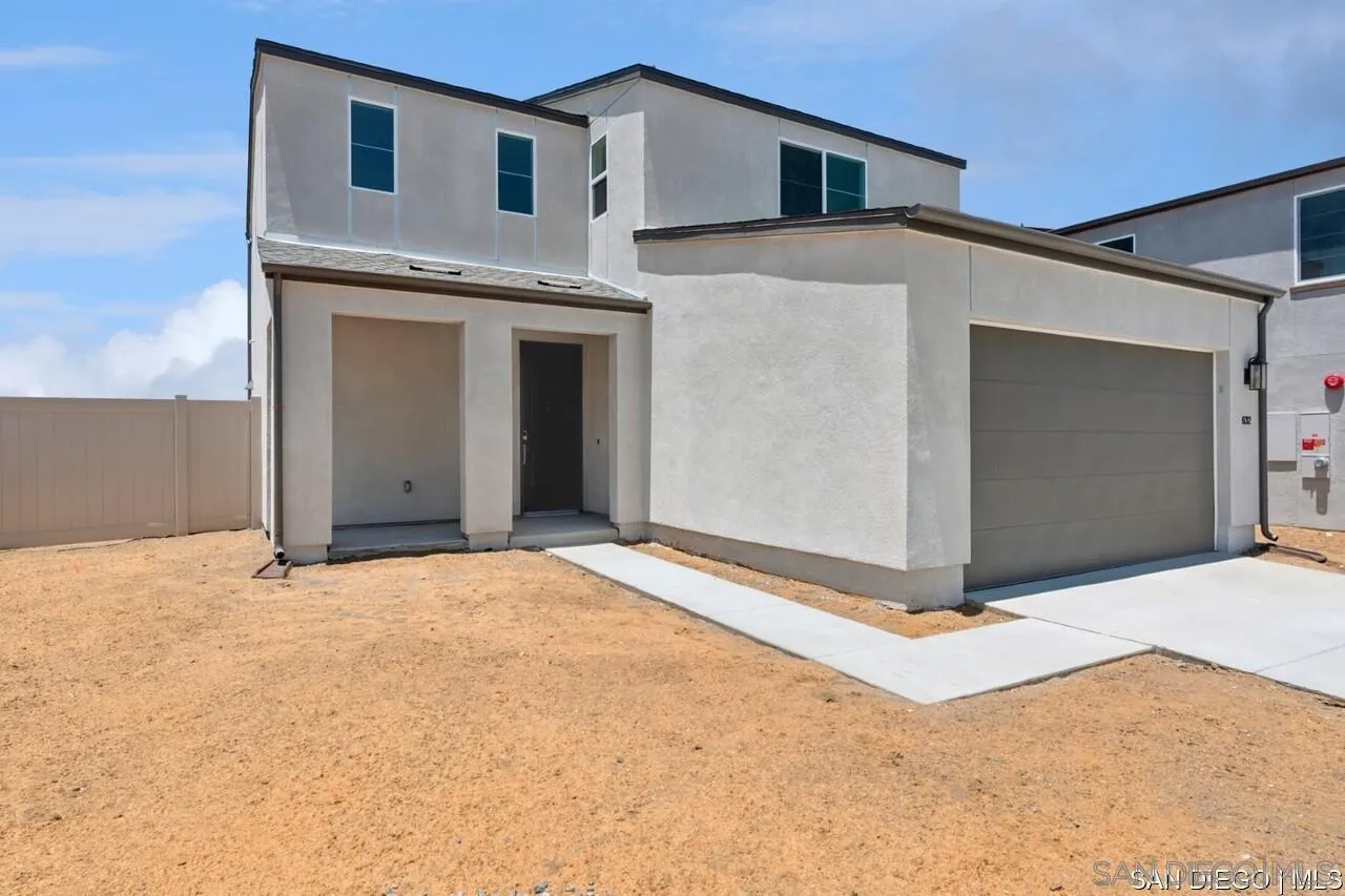 632 Meadowood Street Fallbrook, CA 92028 - Photo 19 of 21 a view of an house with backyard and garage