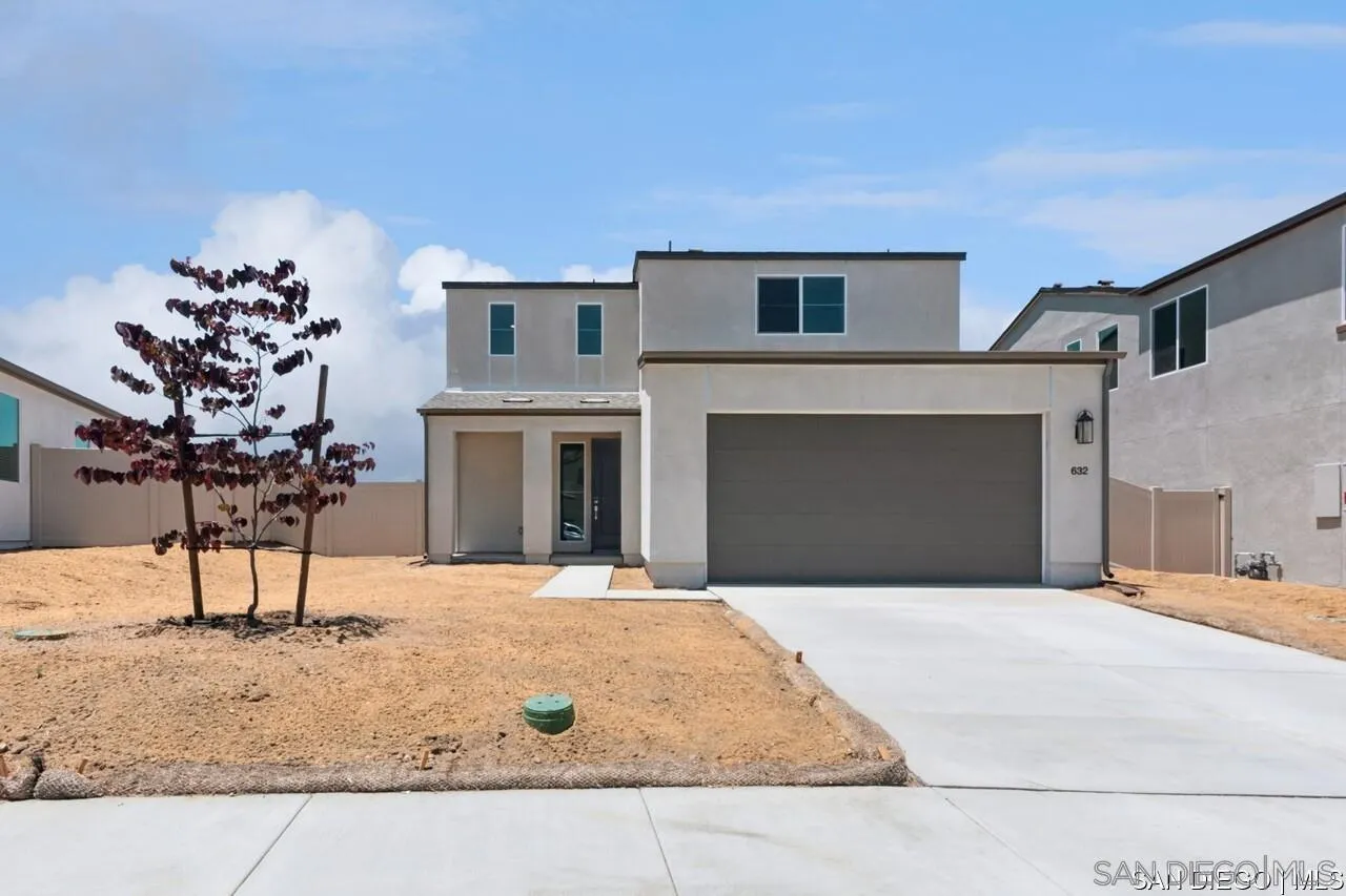 632 Meadowood Street Fallbrook, CA 92028 - Photo 21 of 21 a large white building with a yard in front of it