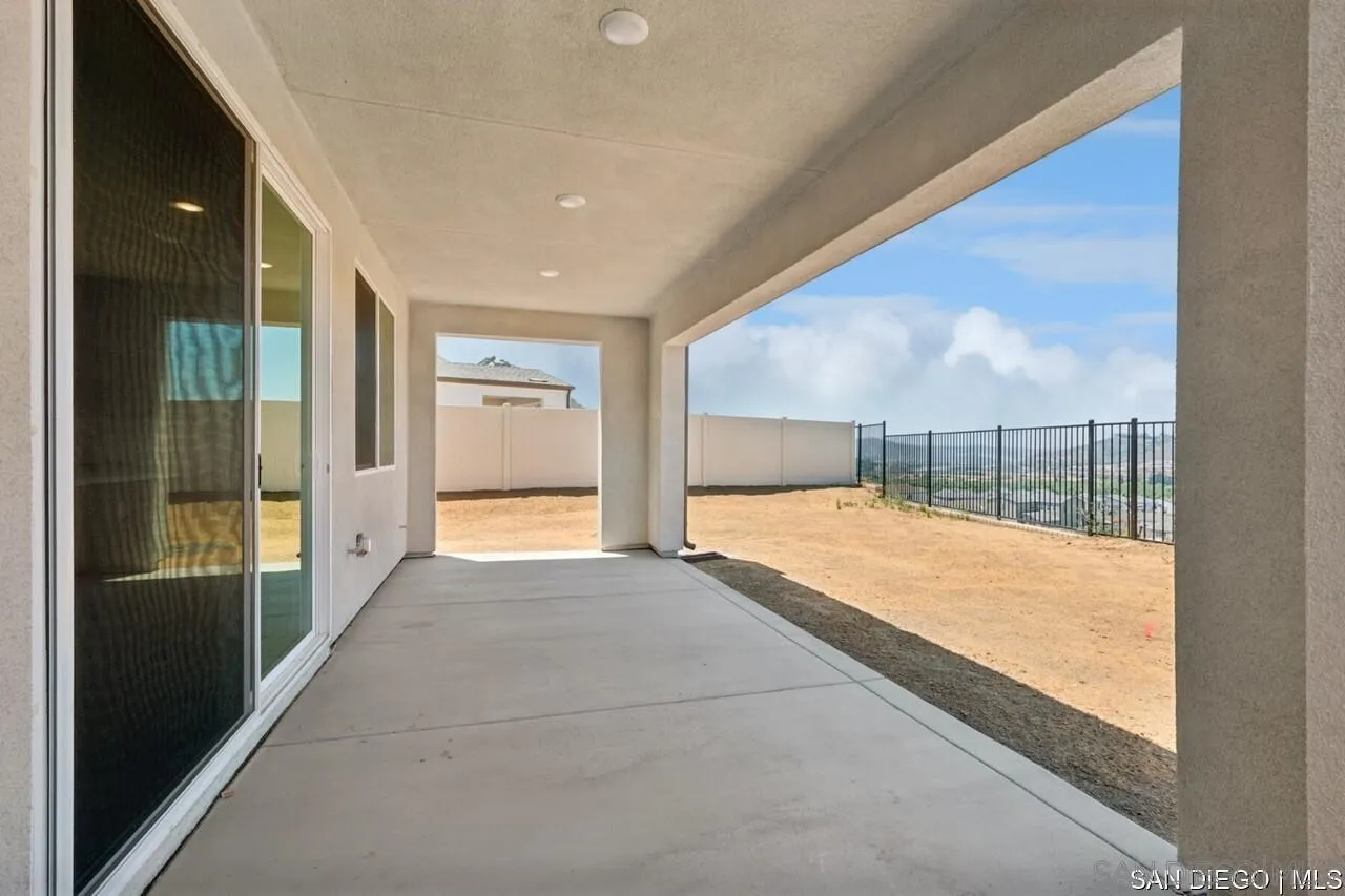 632 Meadowood Street Fallbrook, CA 92028 - Photo 9 of 21 a view of a large hall with a large window