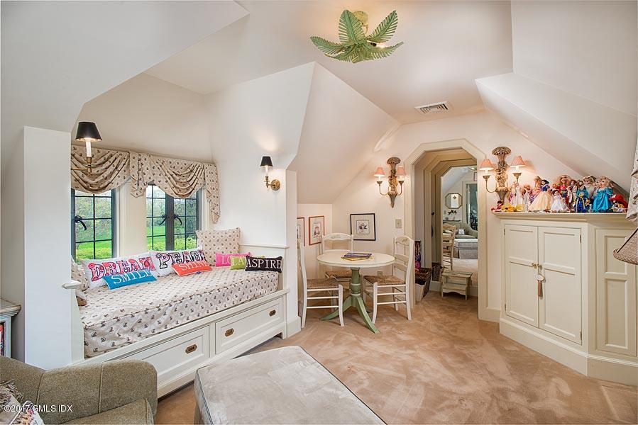 10 Flagler Drive Greenwich, CT 06830 - Photo 13 of 21 a living room with furniture and flowers