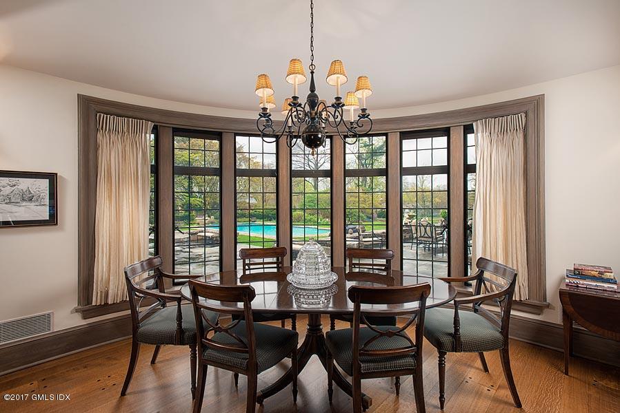10 Flagler Drive Greenwich, CT 06830 - Photo 8 of 21 a view of a dining room with furniture window and wooden floor