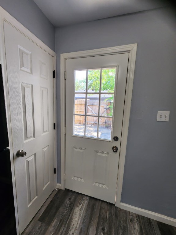 2677 Gessner Road, Unit 202 Houston, TX 77080 - Photo 2 of 7 an empty room with wooden floor and a window