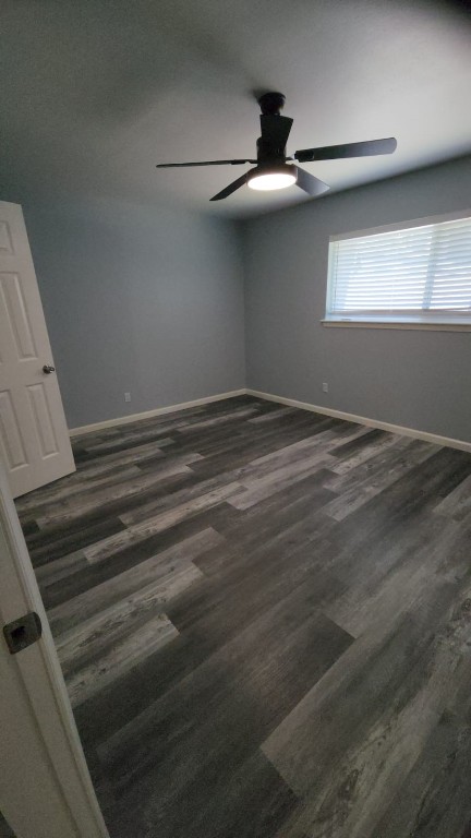 2677 Gessner Road, Unit 202 Houston, TX 77080 - Photo 3 of 7 a view of empty room with window and ceiling fan