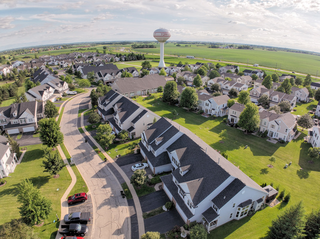 4579 Half Moon Drive, Unit D Yorkville, IL 60560 - Photo 26 of 44 an aerial view of a house with a swimming pool