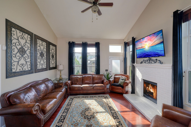 4579 Half Moon Drive, Unit D Yorkville, IL 60560 - Photo 9 of 44 a living room with furniture and a fireplace