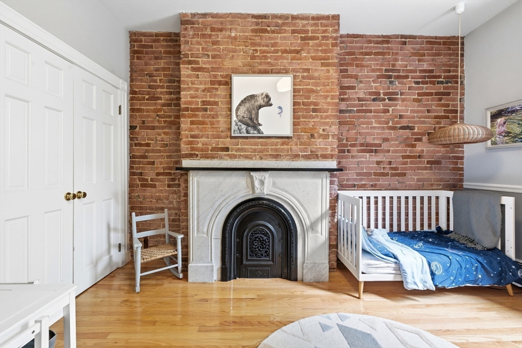 35 High Street, Unit 1 Boston, MA 02129 - Photo 11 of 33 a view of a brick house with entryway and wooden floor