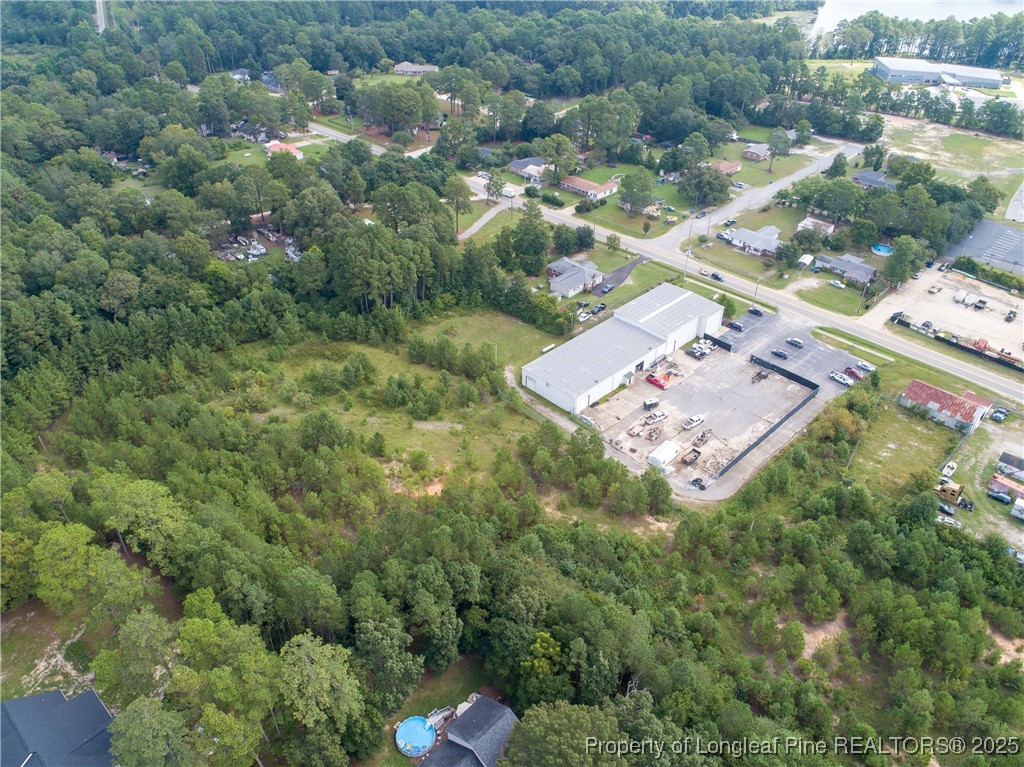 7604 Raeford Road Fayetteville, NC 28314 - Photo 15 of 20 an aerial view of a house with a yard