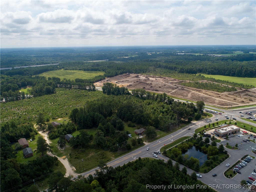 7604 Raeford Road Fayetteville, NC 28314 - Photo 20 of 20 a view of a lake with a yard