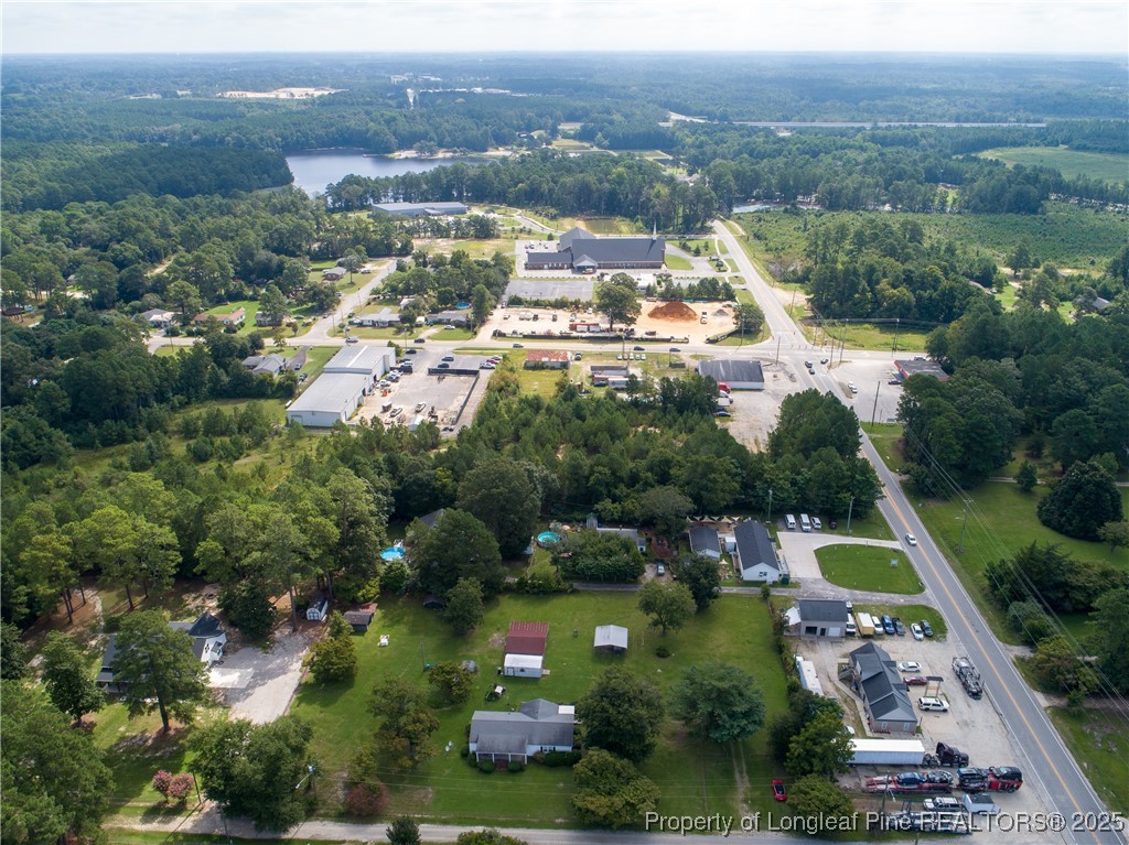 7604 Raeford Road Fayetteville, NC 28314 - Photo 8 of 20 an aerial view of residential houses with outdoor space and river