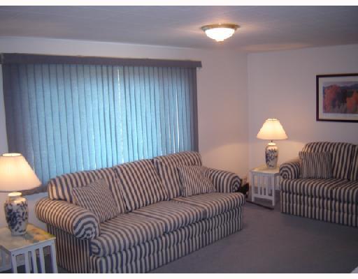 95 Cedar Island Road Narragansett, RI 02882 - Photo 3 of 10 Living Room. Large sunny liiving room and dining area.