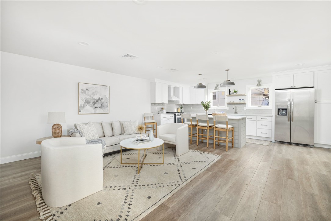 17 Nobert Street, Unit 2 Warren, RI 02885 - Photo 9 of 38 Photo is of the end unit 17 Nobert Unit 1. Same finishes. White tile backsplash instead of grey. Different styled hardware.