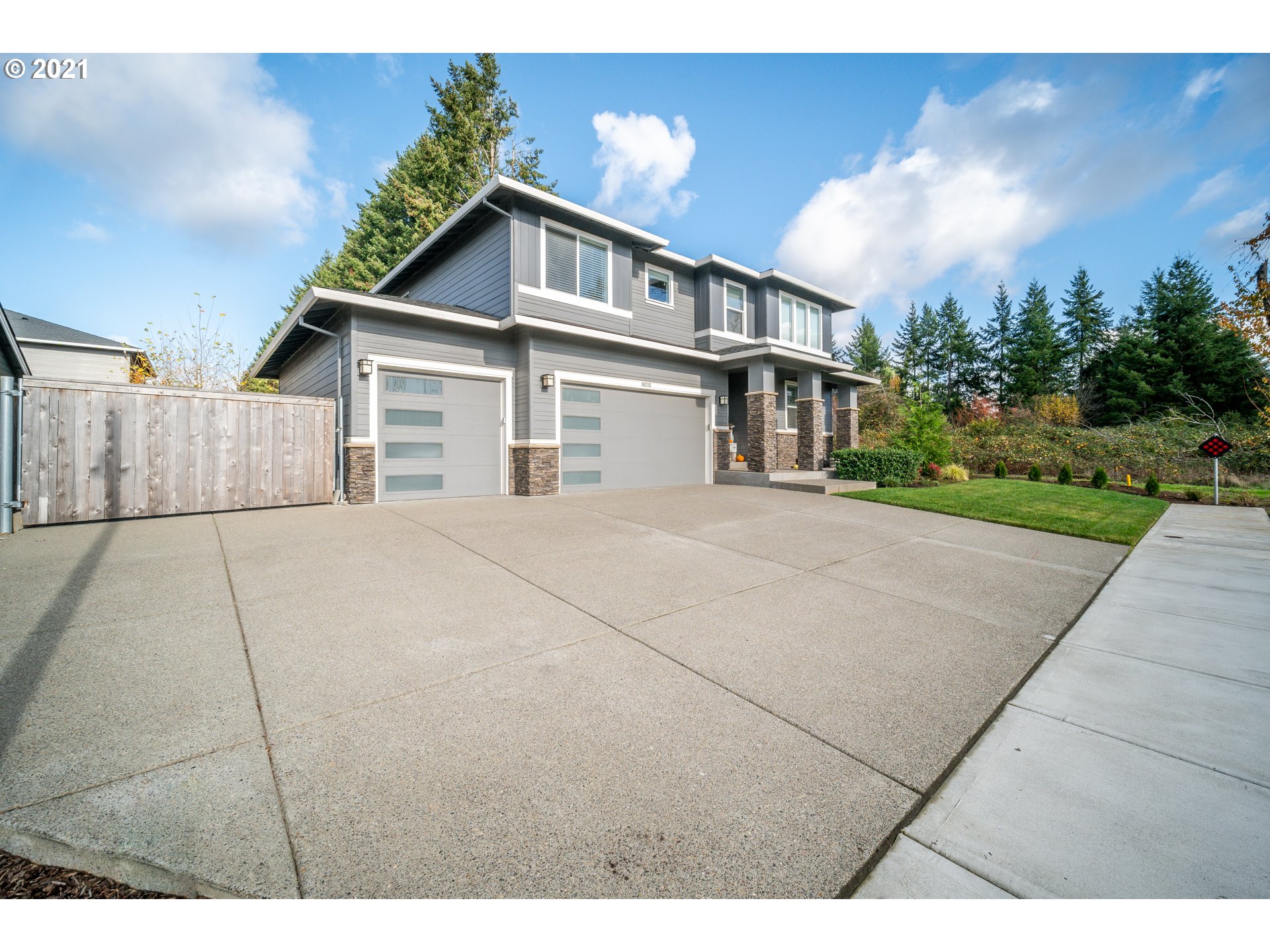 16215 Jada Way Oregon City, OR 97045 - Photo 3 of 32 a view of a house with a yard