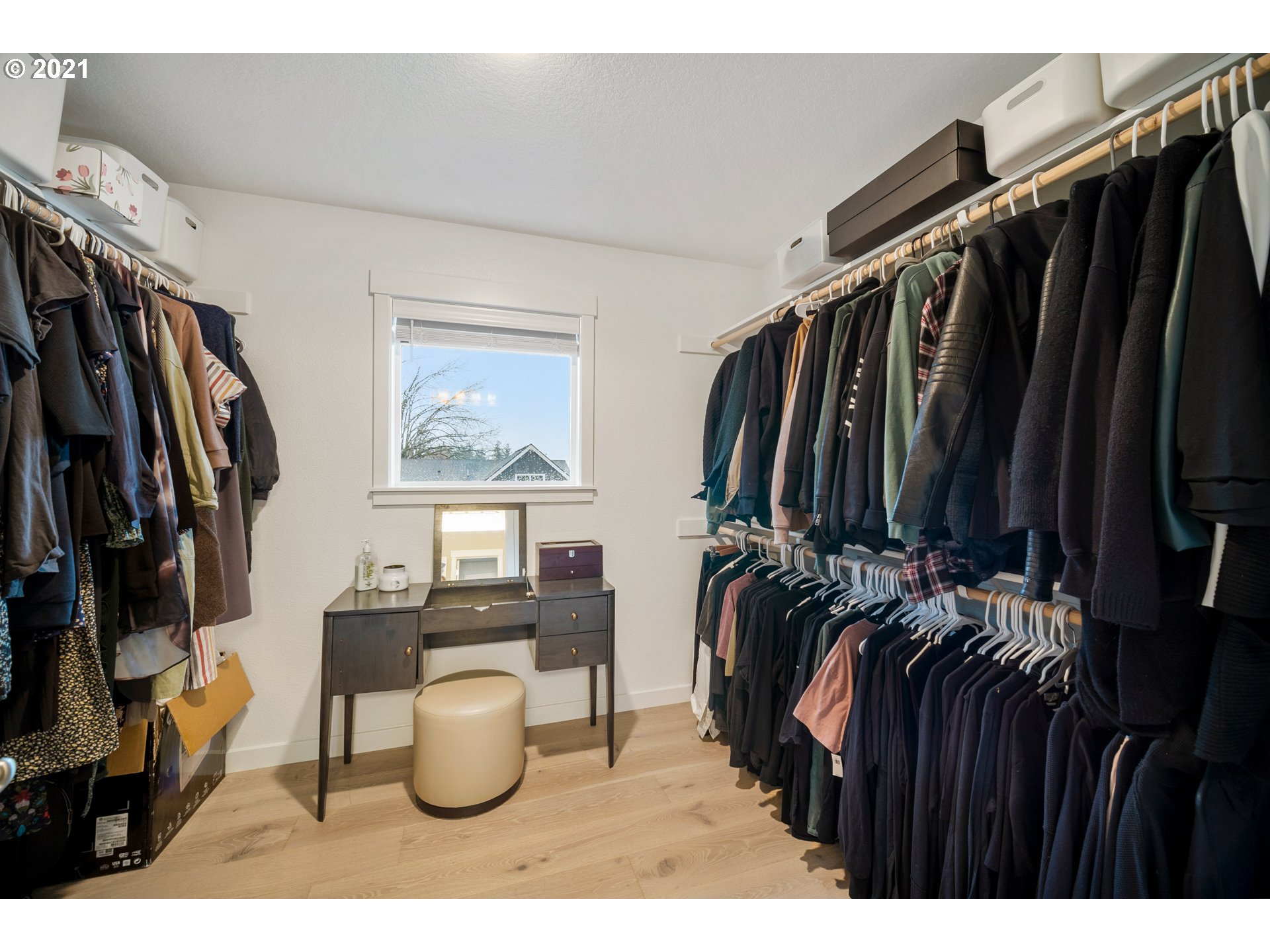 16215 Jada Way Oregon City, OR 97045 - Photo 26 of 32 a view of walk in closet with clothes and shoes