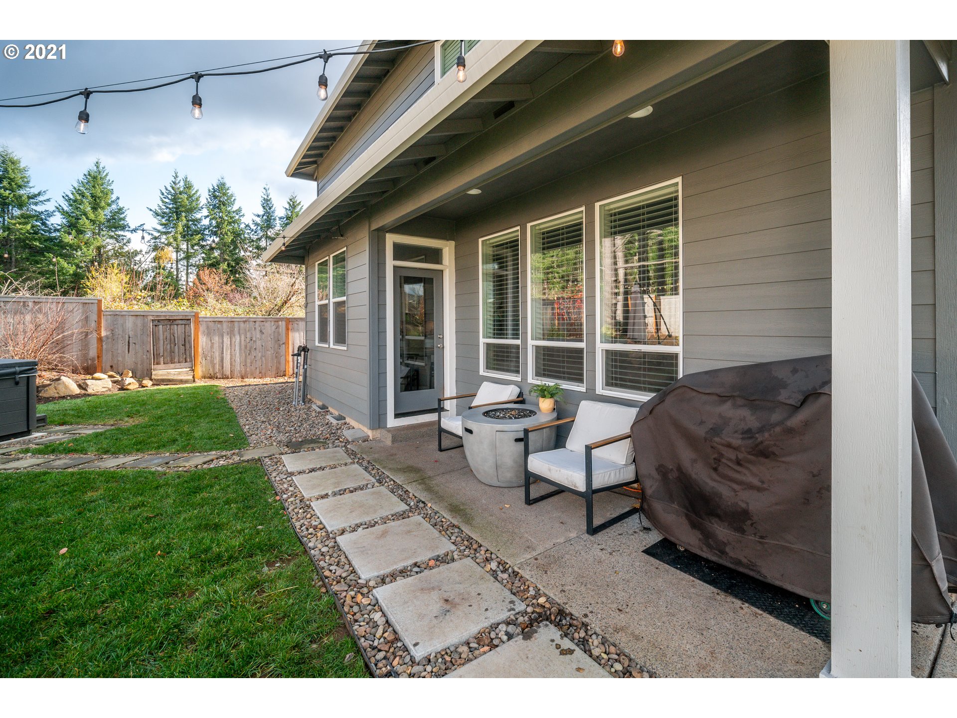 16215 Jada Way Oregon City, OR 97045 - Photo 27 of 32 a view of a house with backyard and sitting area