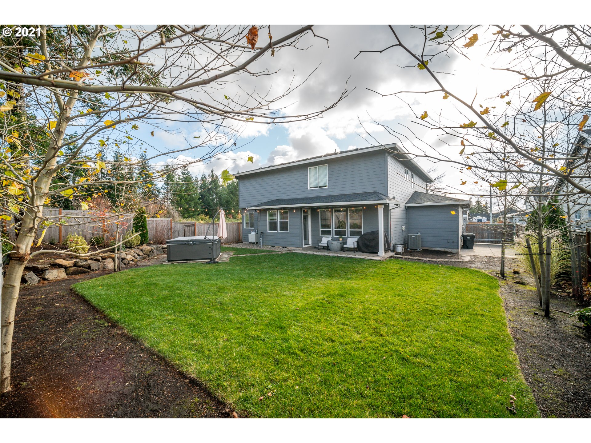16215 Jada Way Oregon City, OR 97045 - Photo 29 of 32 a view of a house with a back yard