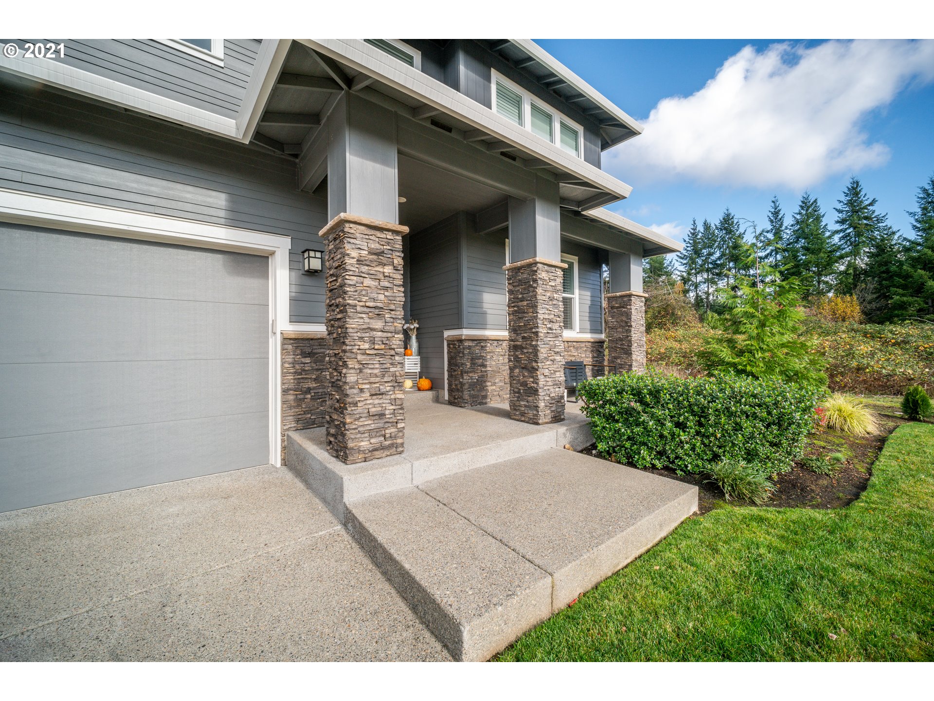 16215 Jada Way Oregon City, OR 97045 - Photo 4 of 32 a front view of a house with a yard