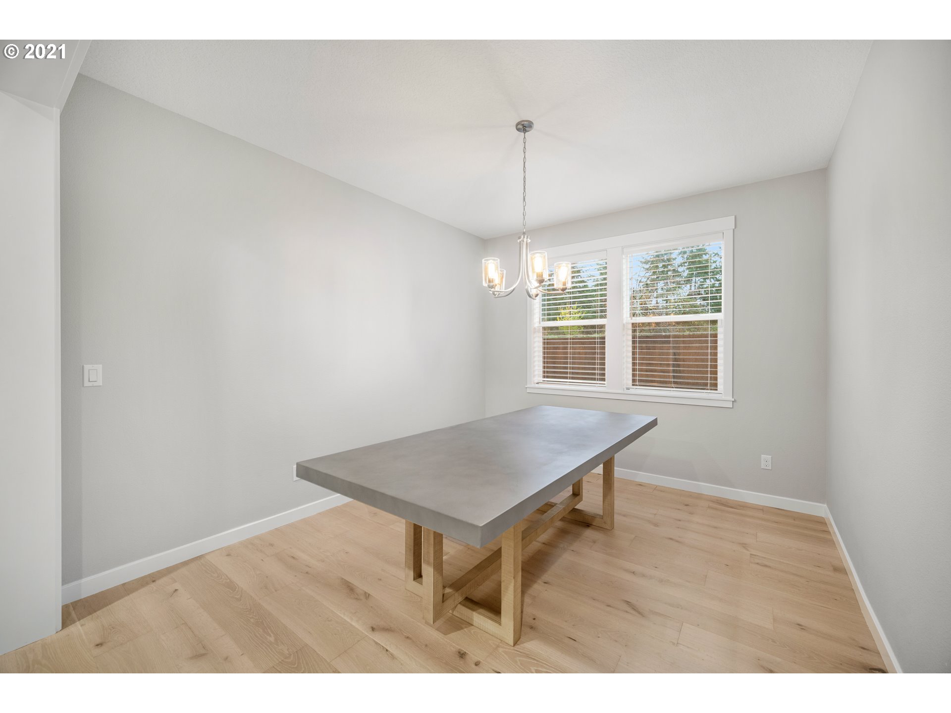 16215 Jada Way Oregon City, OR 97045 - Photo 8 of 32 a view of a room with wooden floor and window