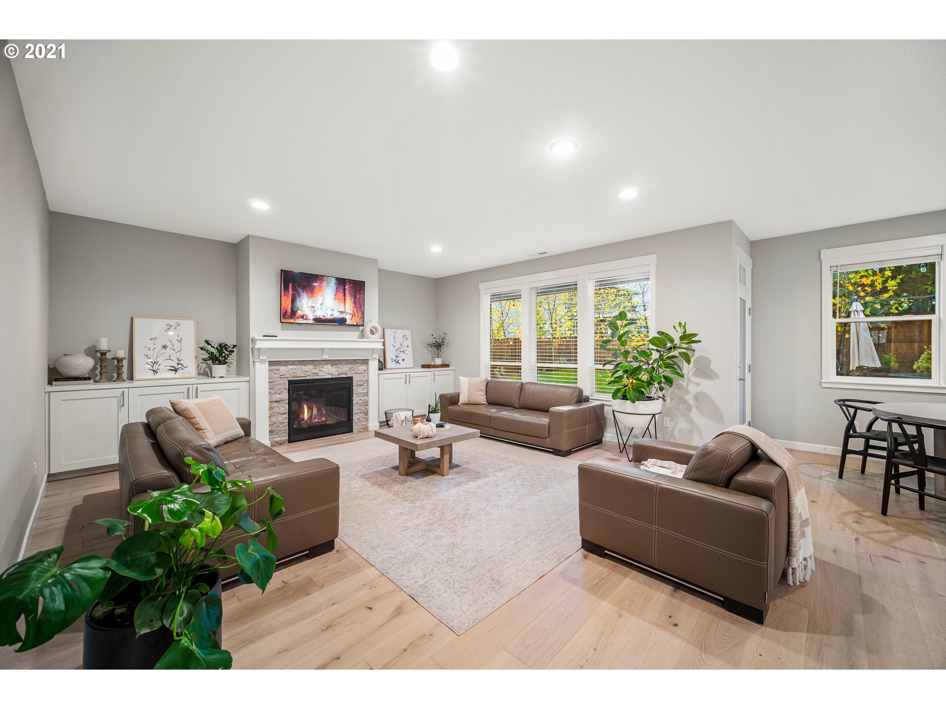 16215 Jada Way Oregon City, OR 97045 - Photo 10 of 32 a living room with furniture and a fireplace