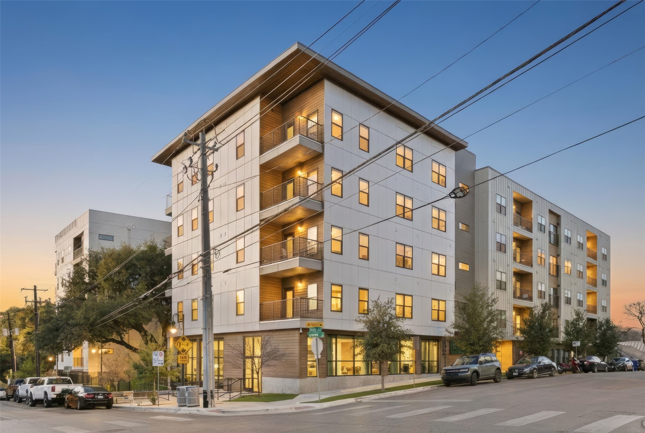 2500 Longview Street, Unit 418 Austin, TX 78705 - Photo 2 of 40 This is the Cascade offering exceptional upscale living and fantastic amenities: gated garage parking, fenced dog park, pool, sundeck, grill, patio, putting green, gym, work lounge and rooftop viewing patio looking at downtown.