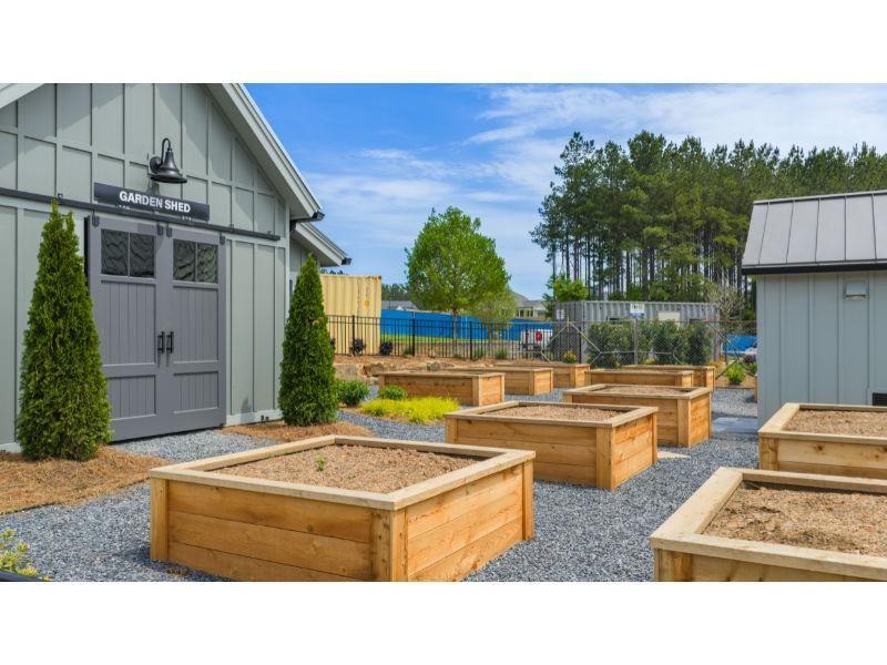 609 Brooke Vw Lane Canton, GA 30115 - Photo 8 of 10 a swimming pool with outdoor seating and yard