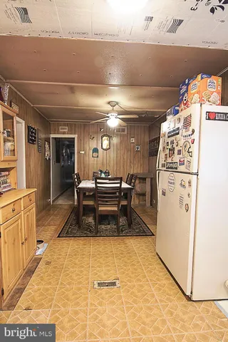 a lobby with furniture and a rug