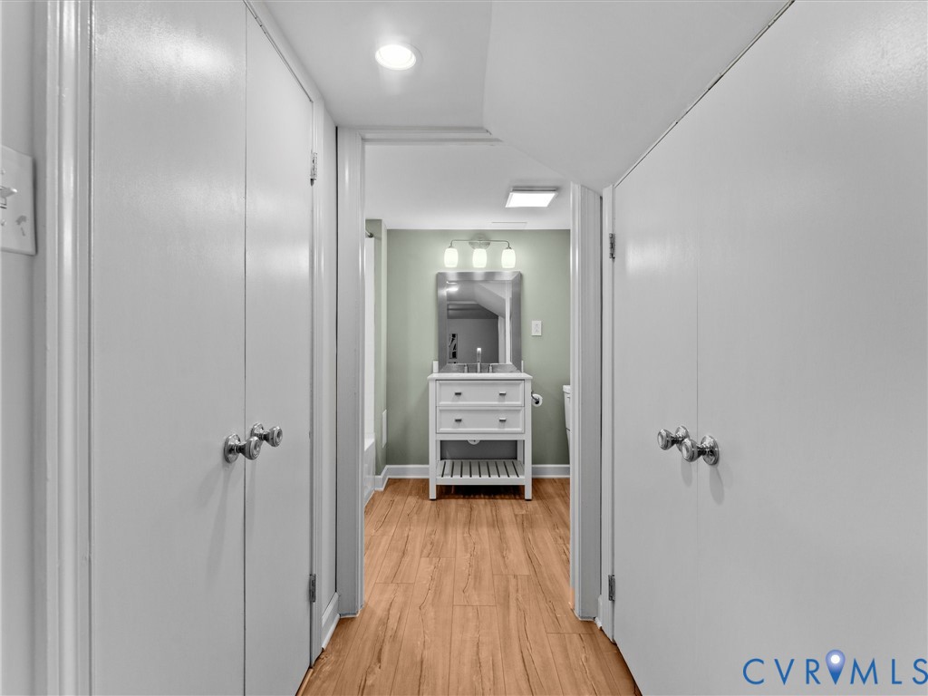 4111 Stratford Road Richmond, VA 23225 - Photo 59 of 72 Double closets, hallway to basement full bathroom