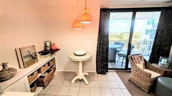 a spacious bedroom with a bed and a window