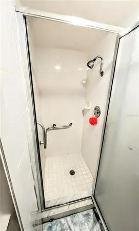 a view of a living room and balcony