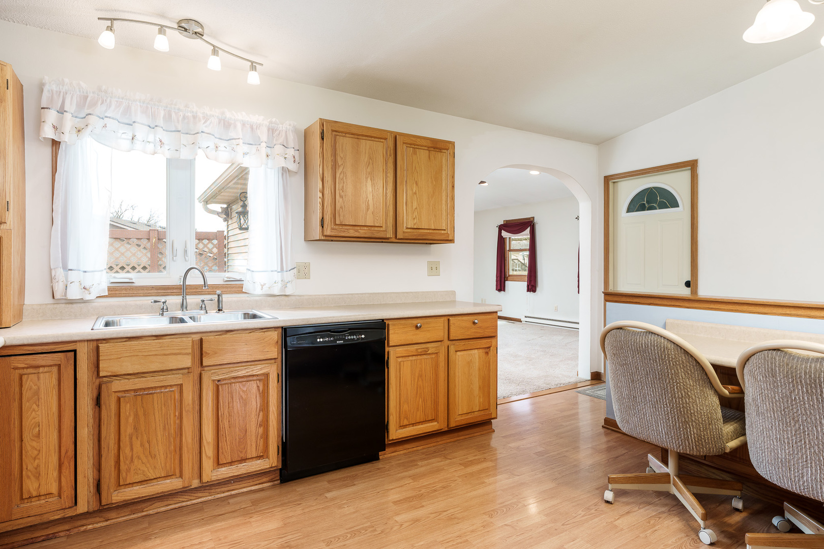603 Fairview Street Durand, IL 61024 - Photo 8 of 21 a spacious bathroom with a granite countertop sink and a mirror
