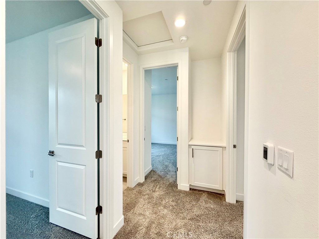 26893 Rubicon Road Menifee, CA 92586 - Photo 16 of 32 a view of a bathroom with a glass door shower